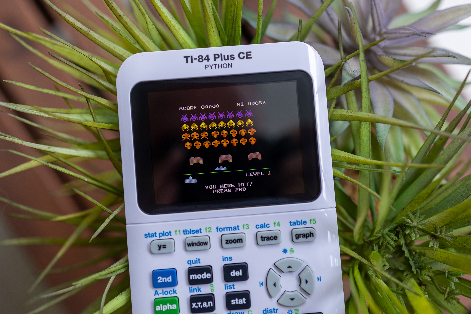 The non-infringing "Spaze Invaders" on a TI-84 graphing calculator.