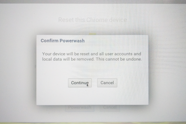 Confirm Powerwash dialog box on Chromebook screen.