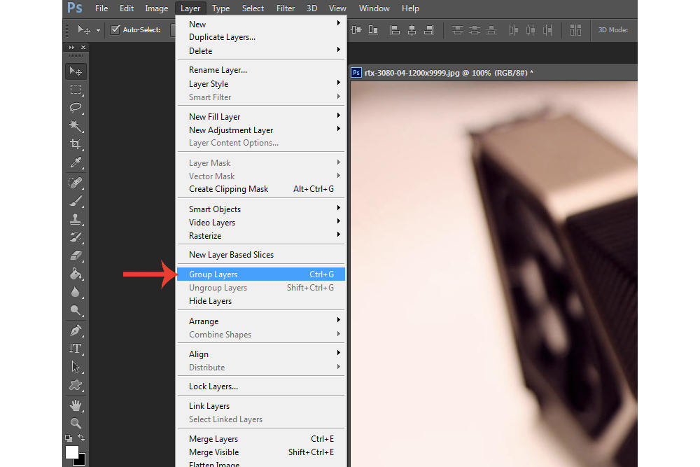 The Group Layers option in Photoshop, used to add selected layers within a dedicated folder.