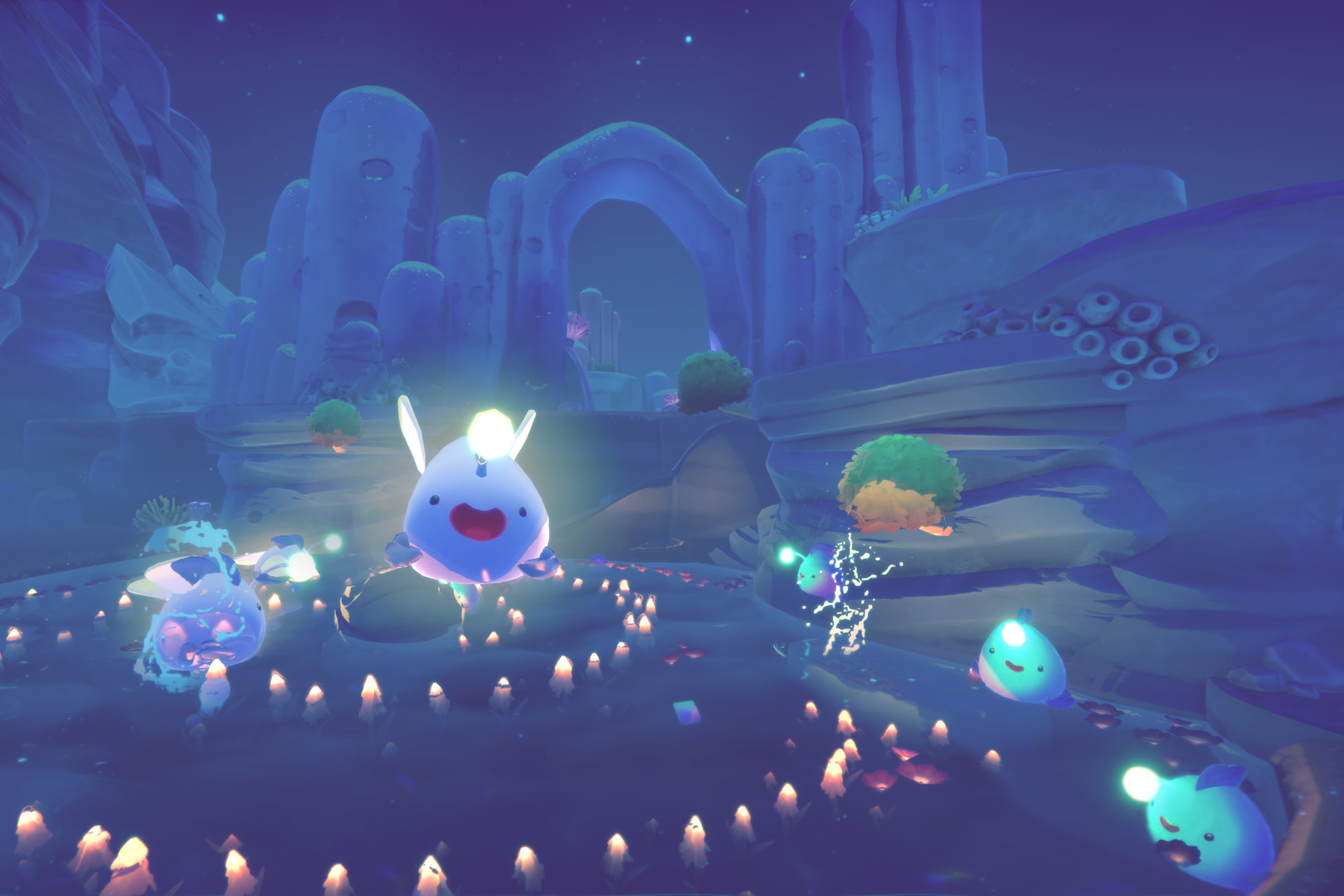 Wild slimes glow at night in Slime Rancher 2
