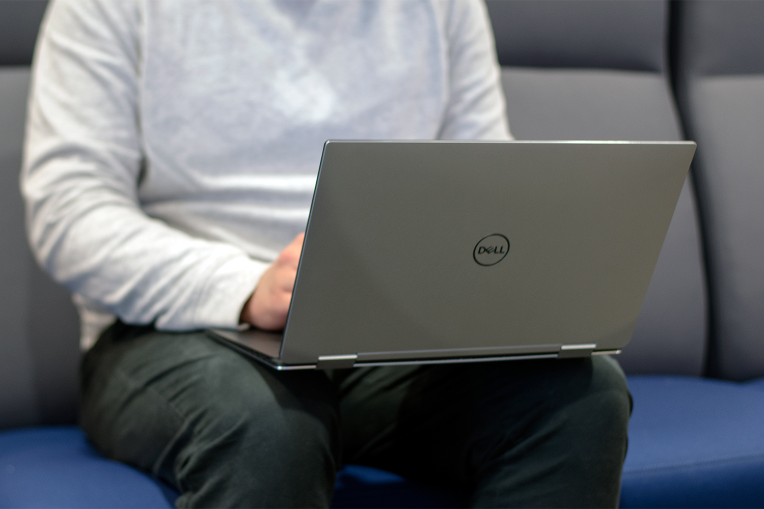 Dell's XPS 15 laptop being used on someone's lap.